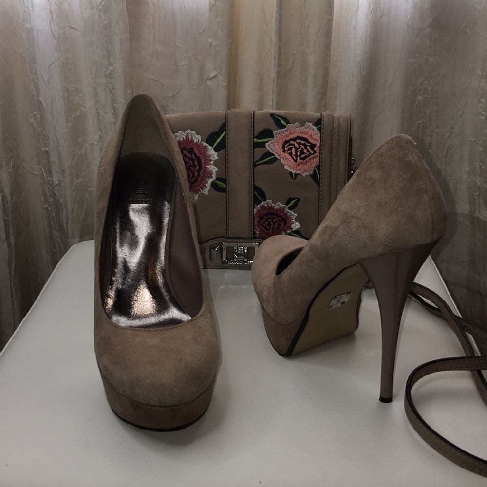Suede nude closed toe heels.